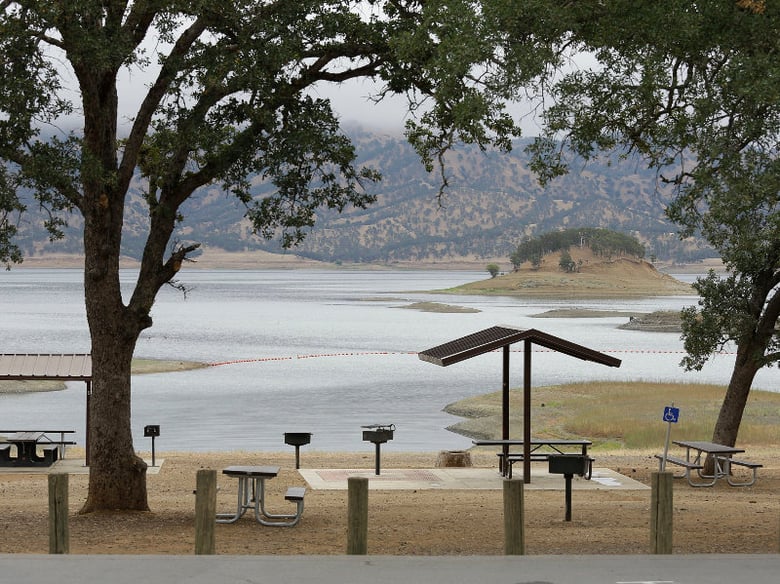 A picnic area is seen along Lake Berryessa with parts of California's newest national monument in the background Friday, July 10, 2015, near Berryessa Snow Mountain National Monument, Calif. 